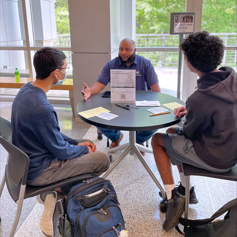 David Williams (center), HVRP North Carolina Program Manager, meeting with Wake Technical Community College students.